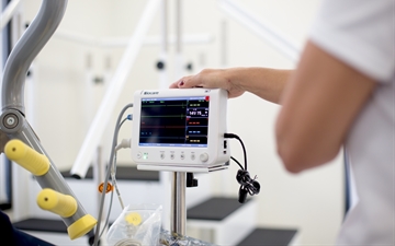 Nurse measuring results of a cardiopulmonary exercise test in Air care centre Portugal (Respiratory Rehab Center)